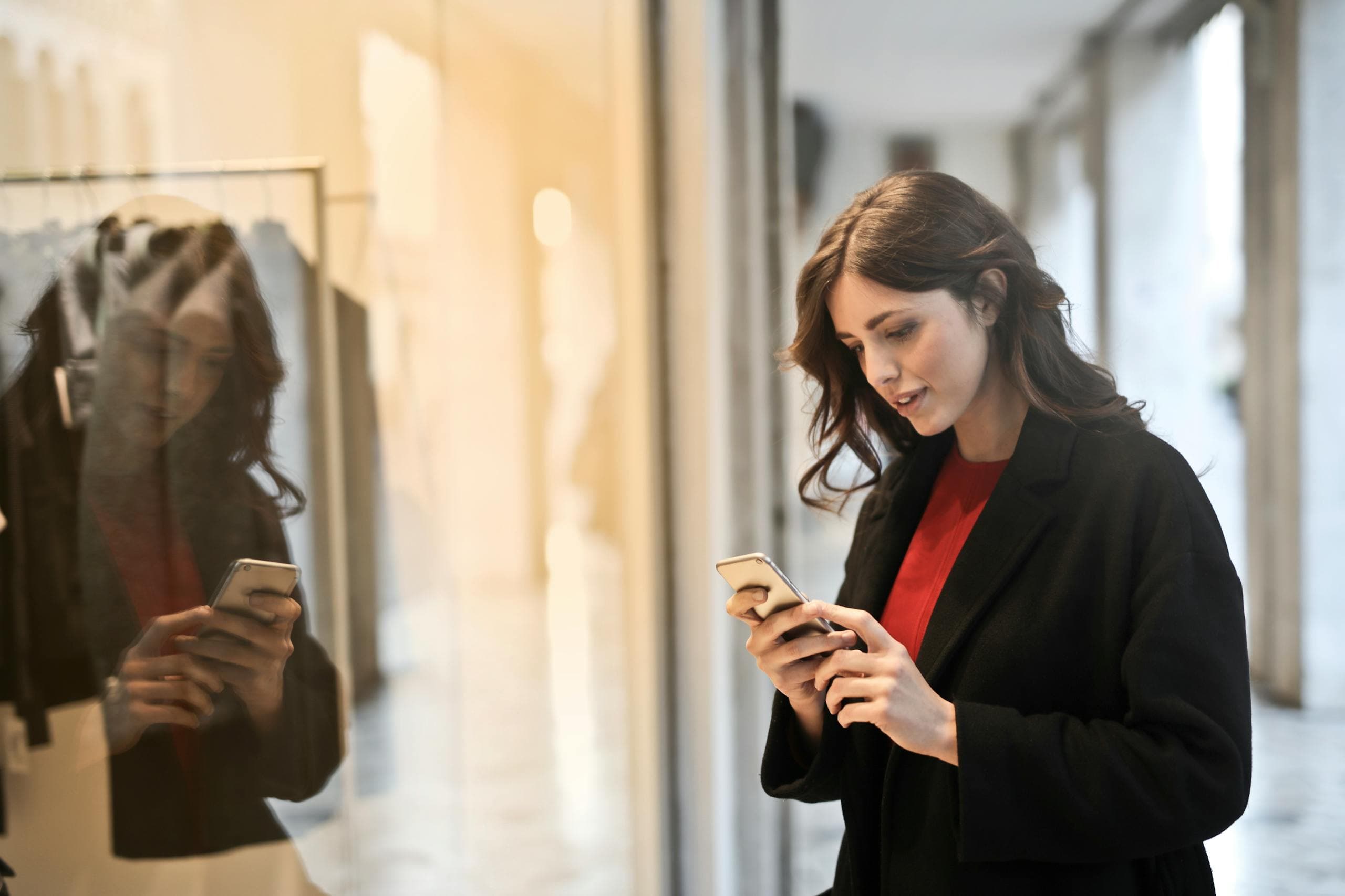 Person using a smartphone in a bright interior - imaging, perception, and vision